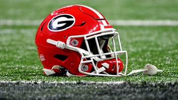 Jan 10, 2022; Indianapolis, IN, USA; A Georgia Bulldogs helmet sits on the field after the Georgia Bulldogs beat the Alabama Crimson Tide in the 2022 CFP college football national championship game at Lucas Oil Stadium. Mandatory Credit: Trevor Ruszkowski-Imagn Images