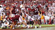 Arkansas running back Ja’Quinden Jackson celebrates after scoring against Tennessee.