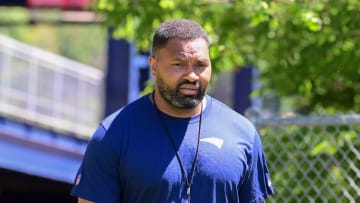 Jun 10, 2024; Foxborough, MA, USA;  New England Patriots head coach Jerod Mayo  walks to a press conference before minicamp at Gillette Stadium. Mandatory Credit: Eric Canha-USA TODAY Sports