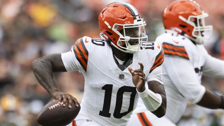 Aug 10, 2024; Cleveland, Ohio, USA; Cleveland Browns quarterback Tyler Huntley (10) runs the ball as he looks for an available receiver against the Green Bay Packers during the second quarter at Cleveland Browns Stadium. Mandatory Credit: Scott Galvin-USA TODAY Sports