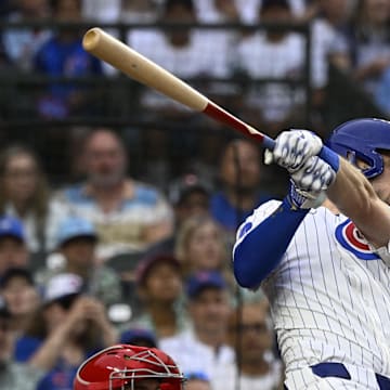 Chicago Cubs outfielder Kyle Tucker (30) hits a two RBI single against the St. Louis Cardinals during the third inning at Wrigley Field on July 6.