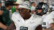 Sep 27, 2025; University Park, Pennsylvania, USA; Oregon Ducks running back Jordon Davison (0) reacts after defeating the Penn State Nittany Lions at Beaver Stadium. Mandatory Credit: Matthew O'Haren-Imagn Images
