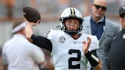 Nov 29, 2025; Knoxville, Tennessee, USA;  Vanderbilt Commodores quarterback Diego Pavia (2) warms up before a game against the Tennessee Volunteers at Neyland Stadium. Mandatory Credit: Randy Sartin-Imagn Images
