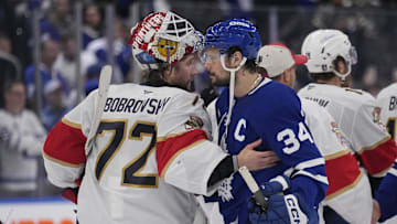 May 18, 2025; Toronto, Ontario, CAN; Toronto Maple Leafs forward Auston Matthews (34) and Florida Panthers goaltender Sergei Bobrovsky (72) shake hands after game seven of the second round of the 2025 Stanley Cup Playoffs at Scotiabank Arena. Mandatory Credit: John E. Sokolowski-Imagn Images
