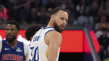 Mar 8, 2025; San Francisco, California, USA; Golden State Warriors guard Stephen Curry (30) looks at forward Gui Santos (15) after defensive stand against the Detroit Pistons in the third quarter at Chase Center. Mandatory Credit: David Gonzales-Imagn Images
