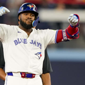 Jun 29, 2024; Toronto, Ontario, CAN; Toronto Blue Jays first base Vladimir Guerrero Jr. (27) celebrates his double against the New York Yankees during the sixth inning at Rogers Centre.