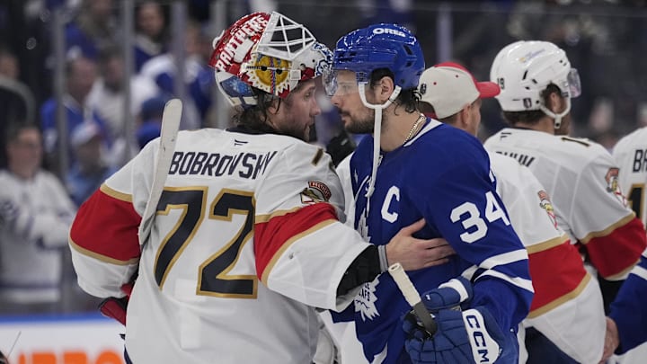 Toronto Maple Leafs forward Auston Matthews and Florida Panthers goaltender Sergei Bobrovsky shake hands.