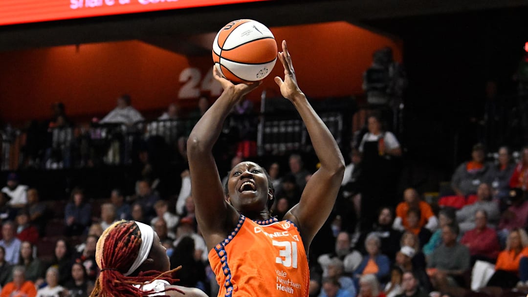Connecticut Sun center Tina Charles (31) shoots over Atlanta Dream guard Rhyne Howard (10) during the second half at Mohegan Sun Arena. 
