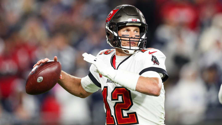 Jan 16, 2023; Tampa, Florida, USA; Tampa Bay Buccaneers quarterback Tom Brady (12) drops back to pass against the Dallas Cowboys in the third quarter during a wild card game at Raymond James Stadium. Mandatory Credit: Nathan Ray Seebeck-USA TODAY Sports