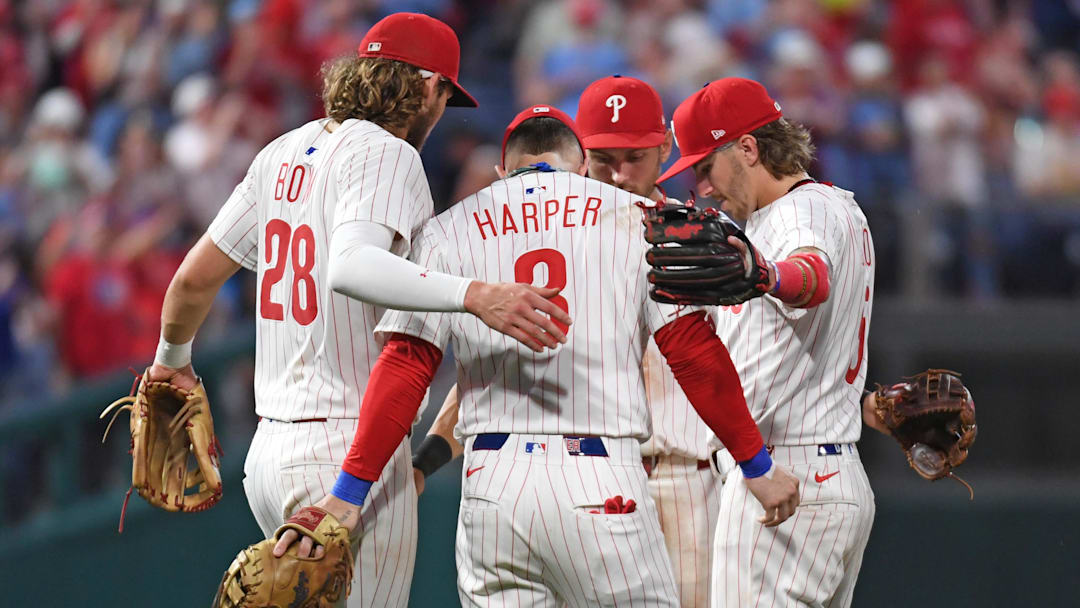 Jun 30, 2025; Philadelphia, Pennsylvania, USA; Philadelphia Phillies third base Alec Bohm (28), first base Bryce Harper (3), shortstop Trea Turner (7) and second base Bryson Stott (5) celebrate win against the San Diego Padres at Citizens Bank Park. Jun 30, 2025; Philadelphia, Pennsylvania, USA; Philadelphia Phillies third base Alec Bohm (28), first base Bryce Harper (3), shortstop Trea Turner (7) and second base Bryson Stott (5) celebrate win against the San Diego Padres at Citizens Bank Park.