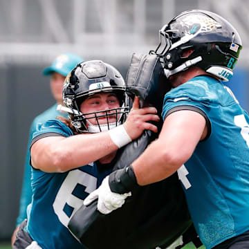 May 10, 2025; Jacksonville, FL, USA; Jacksonville Jaguars offensive lineman Jonah Monheim (60) participates in a drill during rookie minicamp at Miller Electric Center. Mandatory Credit: Travis Register-Imagn Images