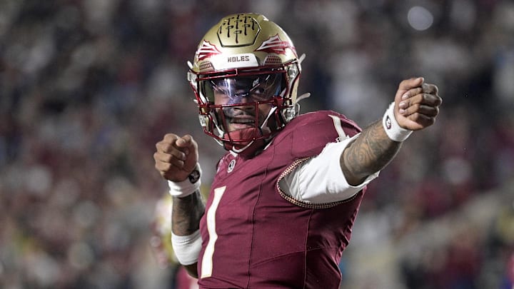 Nov 1, 2025; Tallahassee, Florida, USA; Florida State Seminoles quarterback Tommy Castellanos (1) celebrates a touchdown during the second half against the Wake Forest Demon Deacons at Doak S. Campbell Stadium. Mandatory Credit: Melina Myers-Imagn Images Nov 1, 2025; Tallahassee, Florida, USA; Florida State Seminoles quarterback Tommy Castellanos (1) celebrates a touchdown during the second half against the Wake Forest Demon Deacons at Doak S. Campbell Stadium. Mandatory Credit: Melina Myers-Imagn Images