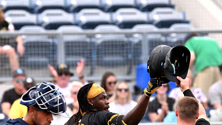 Mar 3, 2024; North Port, Florida, USA; Pittsburgh Pirates catcher Henry Davis (32) celebrates 