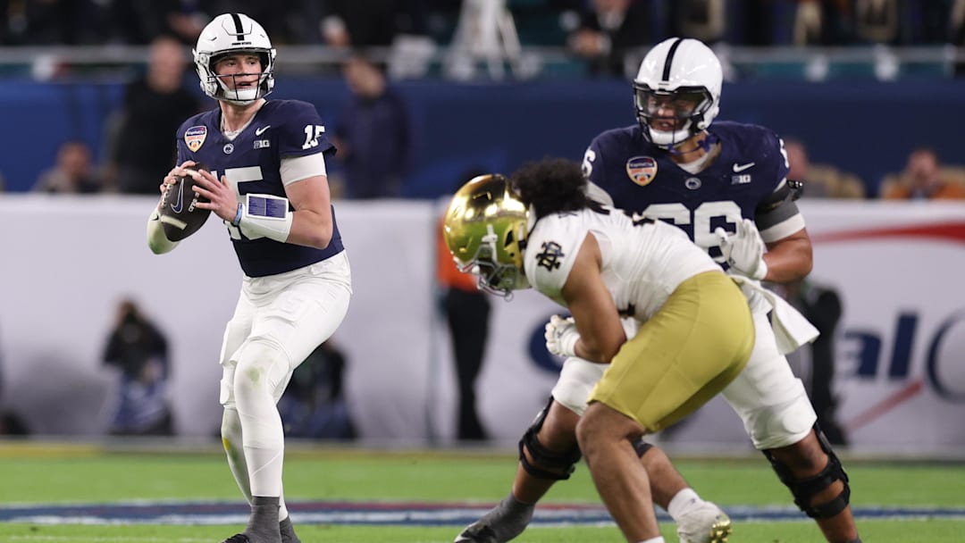 Jan 9, 2025; Miami, FL, USA; Penn State Nittany Lions quarterback Drew Allar (15) looks to throw the ball in the first half against the Notre Dame Fighting Irish in the Orange Bowl at Hard Rock Stadium. Mandatory Credit: Nathan Ray Seebeck-Imagn Images