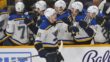 Mar 27, 2025; Nashville, Tennessee, USA;  St. Louis Blues center Dylan Holloway (81) against the Nashville Predators during the third period at Bridgestone Arena. Mandatory Credit: Steve Roberts-Imagn Images