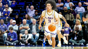 Nov 19, 2024; Baton Rouge, Louisiana, USA;  LSU Tigers guard Curtis Givens III (3) brings the ball up court against the Charleston Southern Buccaneers during the first half at Pete Maravich Assembly Center. Mandatory Credit: Stephen Lew-Imagn Images