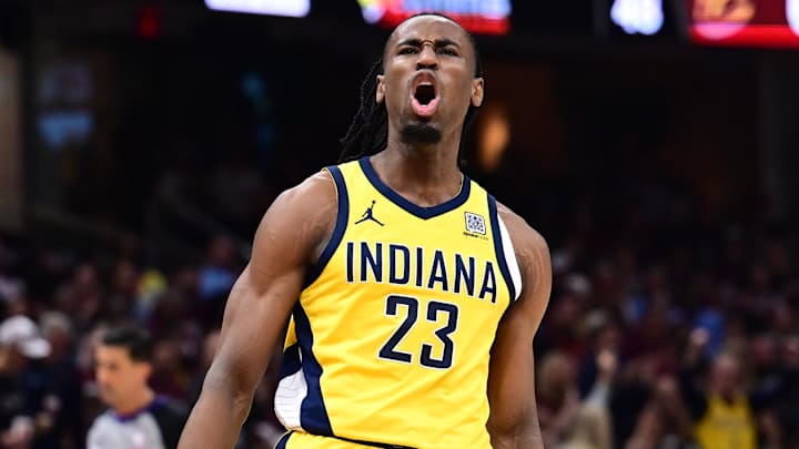 Indiana Pacers player Aaron Nesmith reacts to shooting a three-pointer. Indiana Pacers player Aaron Nesmith reacts to shooting a three-pointer.
