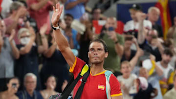 Rafael Nadal waves to the crowd after losing at the Paris 2024 Olympic Summer Games.