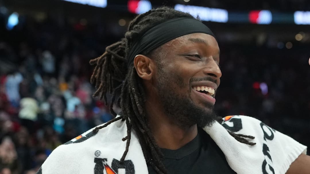 Feb 7, 2026; Portland, Oregon, USA; Portland Trail Blazers forward Jerami Grant (9, left) and guard Vit Krejci (27) celebrate after defeating the Memphis Grizzlies 122–115 at Moda Center. Mandatory Credit: Soobum Im-Imagn Images