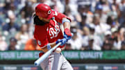 Jun 15, 2025; Detroit, Michigan, USA;  Cincinnati Reds outfielder Connor Joe (17) hits a sacrifice fly in the fourth inning against the Detroit Tigers at Comerica Park. Mandatory Credit: Rick Osentoski-Imagn Images