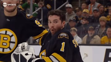 Bruins goalie Jeremy Swayman was shocked after a slap shot took his helmet right off