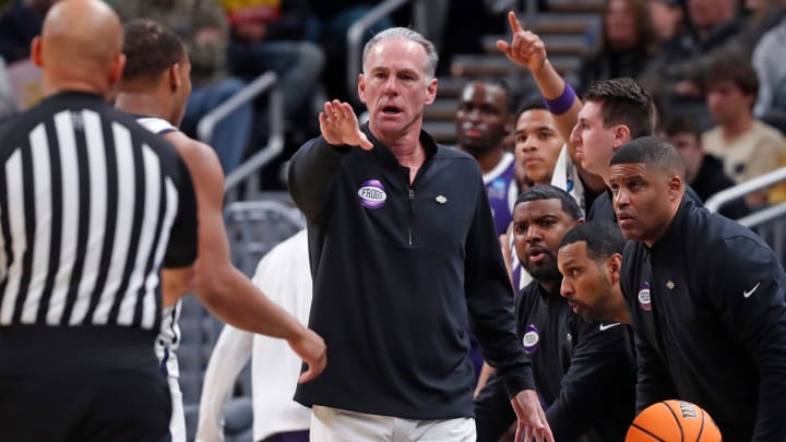 TCU Horned Frogs head coach Jamie Dixon talks to an official during NCAA Men’s Basketball Tournament game against the Utah State Aggies, Friday, March 22, 2024, at Gainbridge Fieldhouse in Indianapolis. Utah State Aggies won 88-72.