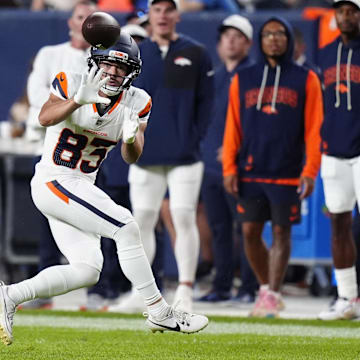 Aug 16, 2025; Denver, Colorado, USA; Denver Broncos wide receiver Michael Bandy (83) prepares to catch the ball in the second quarter against the Arizona Cardinals at Empower Field at Mile High. Mandatory Credit: Ron Chenoy-Imagn Images