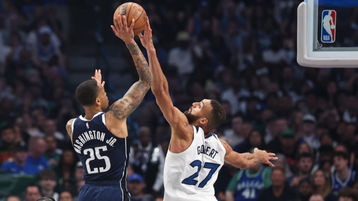 May 28, 2024; Dallas, Texas, USA; Minnesota Timberwolves center Rudy Gobert (27) blocks Dallas Mavericks forward P.J. Washington (25) during the first quarter of game four of the western conference finals for the 2024 NBA playoffs at American Airlines Center. Mandatory Credit: Kevin Jairaj-USA TODAY Sports