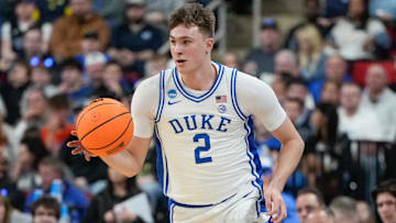Mar 21, 2025; Raleigh, NC, USA; Duke Blue Devils forward Cooper Flagg (2) dribbles the ball against the Mount St. Mary's Mountaineers during the first half in the first round of the NCAA Tournament at Lenovo Center. Mandatory Credit: Bob Donnan-Imagn Images