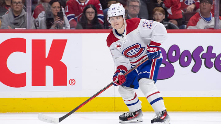 Apr 13, 2024; Ottawa, Ontario, CAN; Montreal Canadiens right wing Cole Caufield (22) skates with the puck in the second period against the Ottawa Senators at the Canadian Tire Centre. Mandatory Credit: Marc DesRosiers-Imagn Images