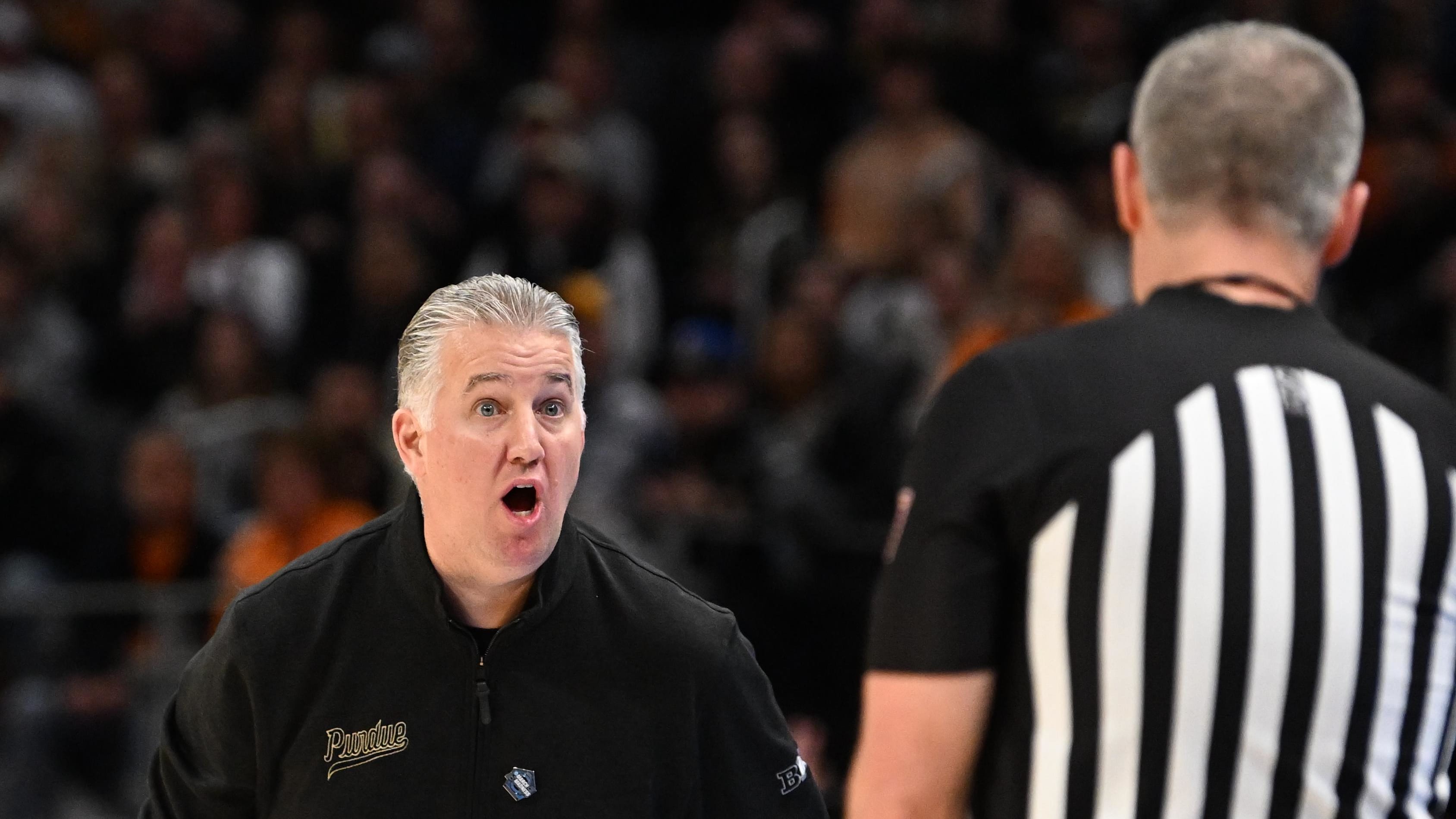  Purdue coach Matt Painter reacts to an official's call in the first half of their win over Tennessee on Sunday.