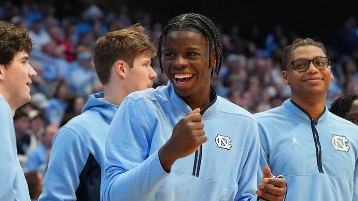 Feb 14, 2026; Chapel Hill, North Carolina, USA; North Carolina Tar Heels forward Caleb Wilson (8) reacts on the bench in the second half at Dean E. Smith Center. Mandatory Credit: Bob Donnan-Imagn Images