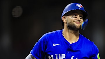 Blue Jays shortstop Bo Bichette (11) reacts after a play in the seventh inning against the Cincinnati Reds at Great American Ball Park on Sept. 2.