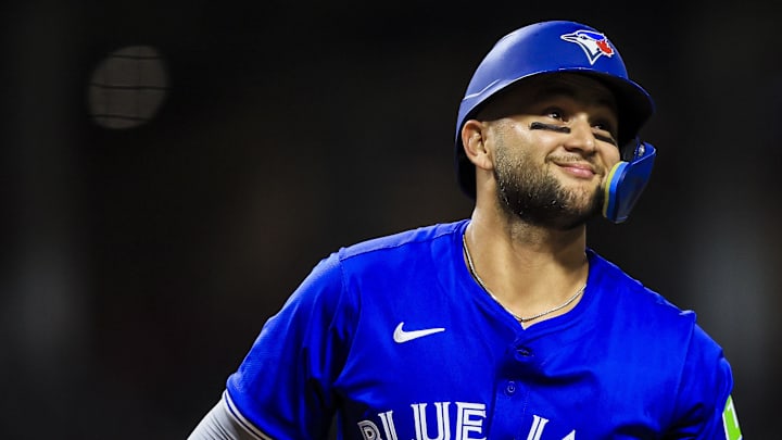 Blue Jays shortstop Bo Bichette (11) reacts after a play in the seventh inning against the Cincinnati Reds at Great American Ball Park on Sept. 2.