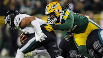Green Bay Packers defensive end Rashan Gary (52) tackles Philadelphia Eagles quarterback Jalen Hurts on Monday, November 10, 2025, at Lambeau Field in Green Bay, Wis. 
Tork Mason/USA TODAY NETWORK-Wisconsin