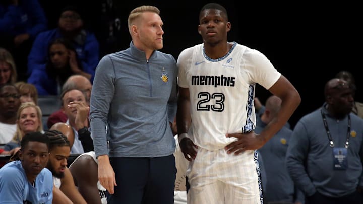 Apr 3, 2026; Memphis, Tennessee, USA; Memphis Grizzlies head coach Tuomas Iisalo talks with forward Cedric Coward (23) during the second quarter against the Toronto Raptors at FedExForum. Mandatory Credit: Petre Thomas-Imagn Images