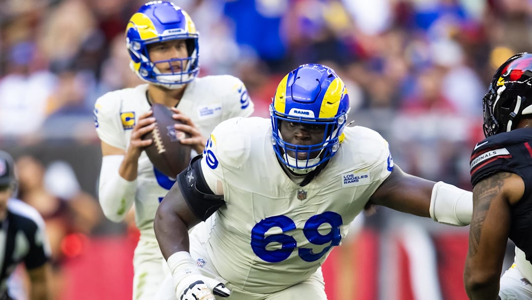 Nov 26, 2023; Glendale, Arizona, USA; Los Angeles Rams guard Kevin Dotson (69) against the Arizona Cardinals at State Farm Stadium. Mandatory Credit: Mark J. Rebilas-Imagn Images