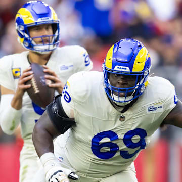 Nov 26, 2023; Glendale, Arizona, USA; Los Angeles Rams guard Kevin Dotson (69) against the Arizona Cardinals at State Farm Stadium. Mandatory Credit: Mark J. Rebilas-Imagn Images