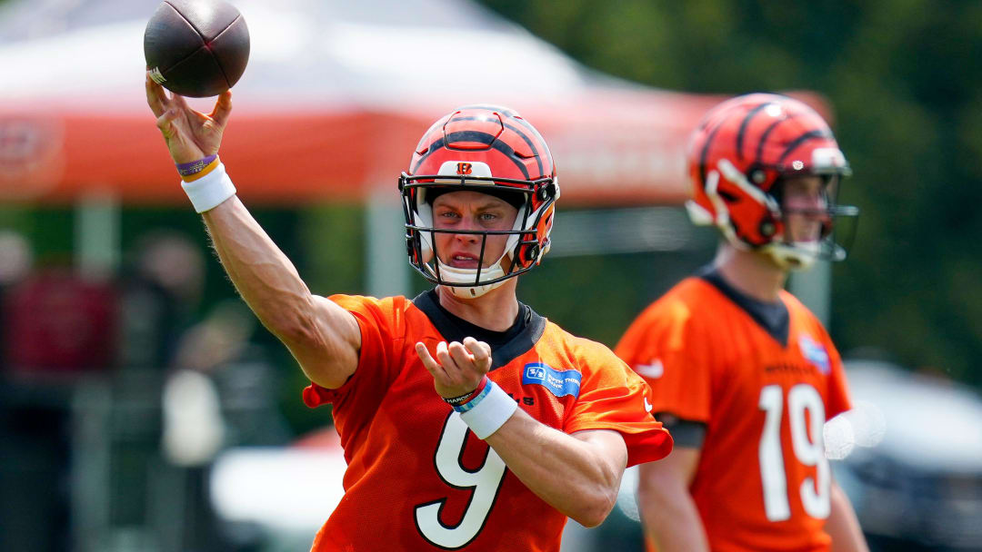 Cincinnati Bengals quarterback Joe Burrow (9) throws a pass during a training camp practice at the Paycor Stadium practice field in downtown Cincinnati on Wednesday, July 26, 2023.