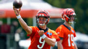 Cincinnati Bengals quarterback Joe Burrow (9) throws a pass during a training camp practice at the Paycor Stadium practice field in downtown Cincinnati on Wednesday, July 26, 2023.