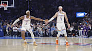 Nov 12, 2025; Oklahoma City, Oklahoma, USA; Oklahoma City Thunder guard Shai Gilgeous-Alexander (2) and Oklahoma City Thunder guard Alex Caruso (9) celebrate after a basket against the Los Angeles Lakers during the second quarter at Paycom Center. Mandatory Credit: Alonzo Adams-Imagn Images