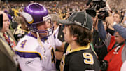 Jan 24, 2010; New Orleans, LA, USA; New Orleans Saints quarterback Drew Brees (9) talks with Minnesota Vikings quarterback Brett Favre (4) after the 2010 NFC Championship game at the Louisiana Superdome. The Saints defeated the Vikings 31-28 in overtime. Mandatory Credit: Matt Stamey-Imagn Images