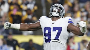 Oct 6, 2024; Pittsburgh, Pennsylvania, USA;  Dallas Cowboys defensive tackle Osa Odighizuwa (97) reacts to sacking Pittsburgh Steelers quarterback Justin Fields (not pictured) during the second quarter at Acrisure Stadium. Mandatory Credit: Charles LeClaire-Imagn Images
