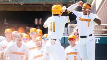 Tennessee's Christian Moore (1) celebrates a home run with Tennessee's Billy Amick (11) during a NCAA baseball tournament Knoxville Super Regional game between Tennessee and Evansville held at Lindsey Nelson Stadium on Friday, June 7, 2024.