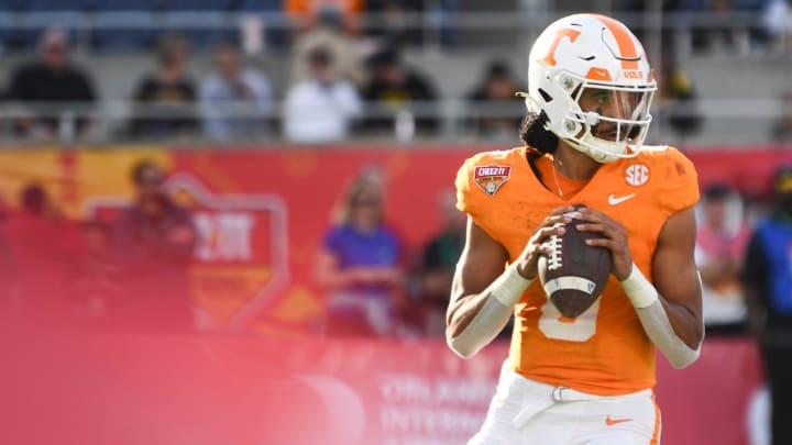 Tennessee quarterback Nico Iamaleava (8) looks down the field during the Citrus Bowl NCAA College football game between Tennessee and Iowa in Orlando, Fla., Monday, Jan. 1, 2024.