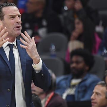 Feb 28, 2020; Atlanta, Georgia, USA; Brooklyn Nets head coach Kenny Atkinson reacts after a play during the game against the Atlanta Hawks during the first half at State Farm Arena.