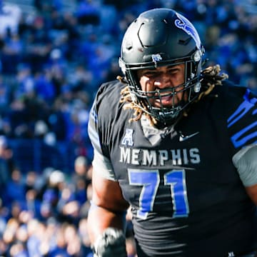 Memphis' Xavier Hill (71) celebrates after the team scored a touchdown during the game between Southern Methodist University and University of Memphis at Simmons Bank Liberty Stadium in Memphis, Tenn., on Saturday, November 18, 2023.