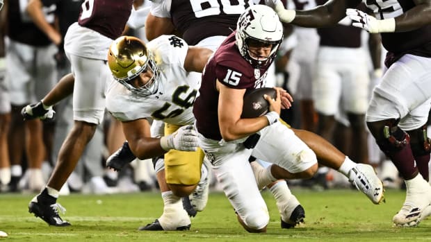 Howard Cross with a sack against Texas A&M