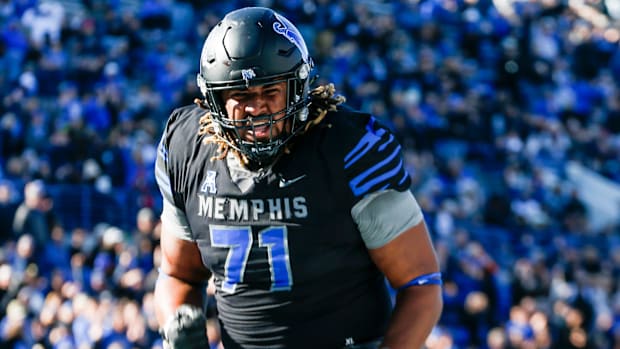 Memphis' Xavier Hill (71) celebrates after the team scored a touchdown during the game between Southern Methodist University 