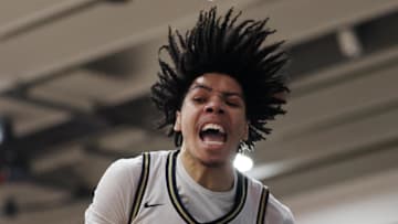 Jan 4, 2025; Gilbert, AZ, USA; Notre Dame High School (CA) forward Tyran Stokes (4) celebrates a slam dunk against Sandra Day O'Connor (AZ) during the Hoophall West High School Invitational at Highland High School. Mandatory Credit: Mark J. Rebilas-Imagn Images